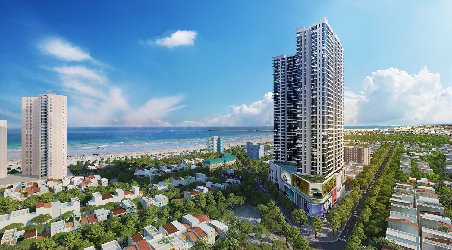 dự án condotel với tòa nhà cao tầng nhìn ra biển, xung quanh có các công trình nhà ở thấp tầng và nhiều cây xanh