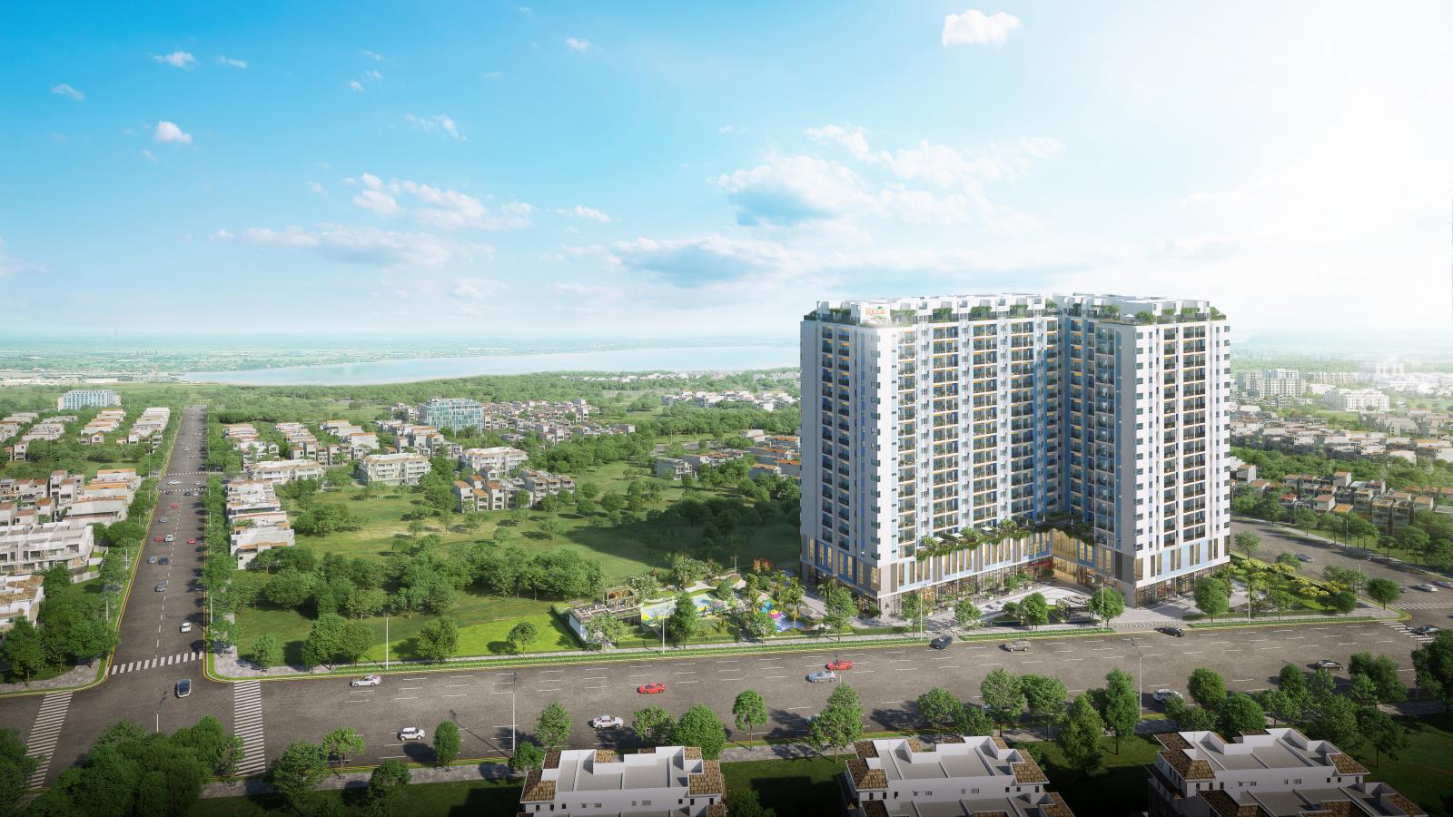 dự án căn hộ cao tầng gồm 2 khối nhà chữ L nằm giáp đường lớn, xung quanh có nhiều công trình thấp tầng và cây xanh