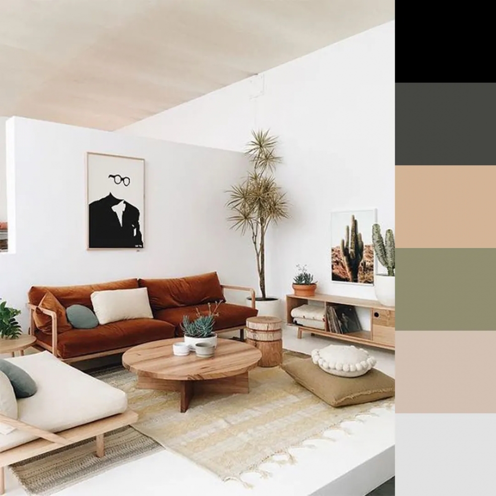 H&igrave;nh ảnh mẫu ph&ograve;ng kh&aacute;ch Japandi t&acirc;m điểm b&agrave; b&agrave;n tr&agrave; gỗ h&igrave;nh tr&ograve;n đặt tr&ecirc;n thảm trải, sofa m&agrave;u v&agrave;ng da b&ograve;, tranh treo tường đen trắng c&aacute; t&iacute;nh, nhấn nh&aacute; th&ecirc;m một v&agrave;i chậu c&acirc;y xanh mướt.