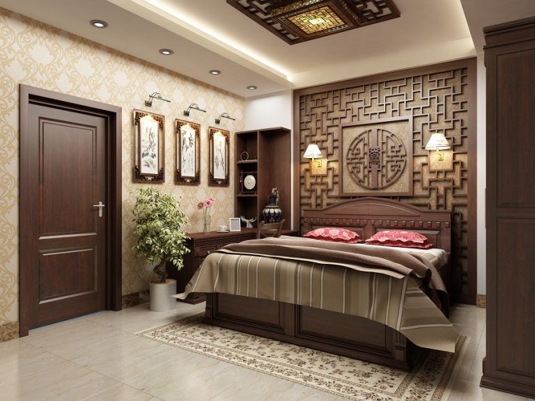 Hình ảnh mẫu phòng ngủ cho người già với nội thất gỗ, tường đầu giường trang trí chạm khắc gỗ cầu kỳ, tranh treo tường tạo điểm nhấn