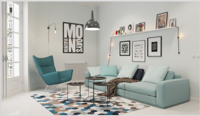 H&igrave;nh ảnh ph&ograve;ng kh&aacute;ch tươi s&aacute;ng với sofa v&agrave; ghế b&agrave;nh m&agrave;u xanh ngọc lam đặt tr&ecirc;n thảm trải họa tiết h&igrave;nh học bắt mắt