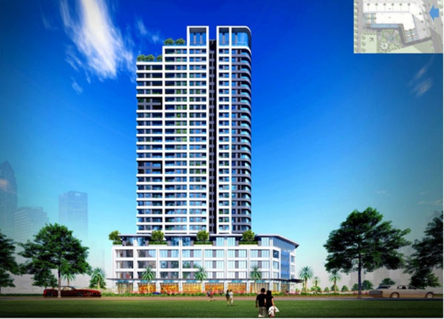 2 người đang đi về phía tòa chung cư cao tầng