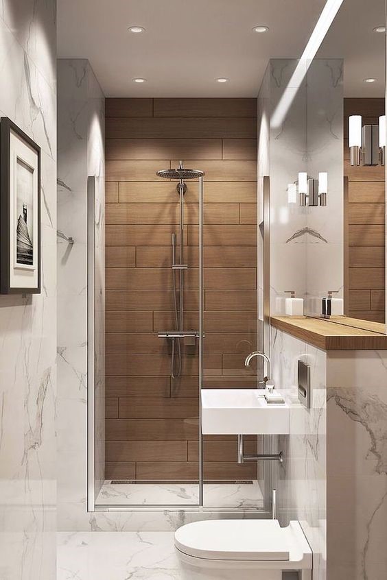H&igrave;nh ảnh ph&ograve;ng tắm nh&agrave; ống 3 tầng kết hợp kinh doanh với s&agrave;n v&agrave; tường ốp đ&aacute; cẩm thạch sang trọng