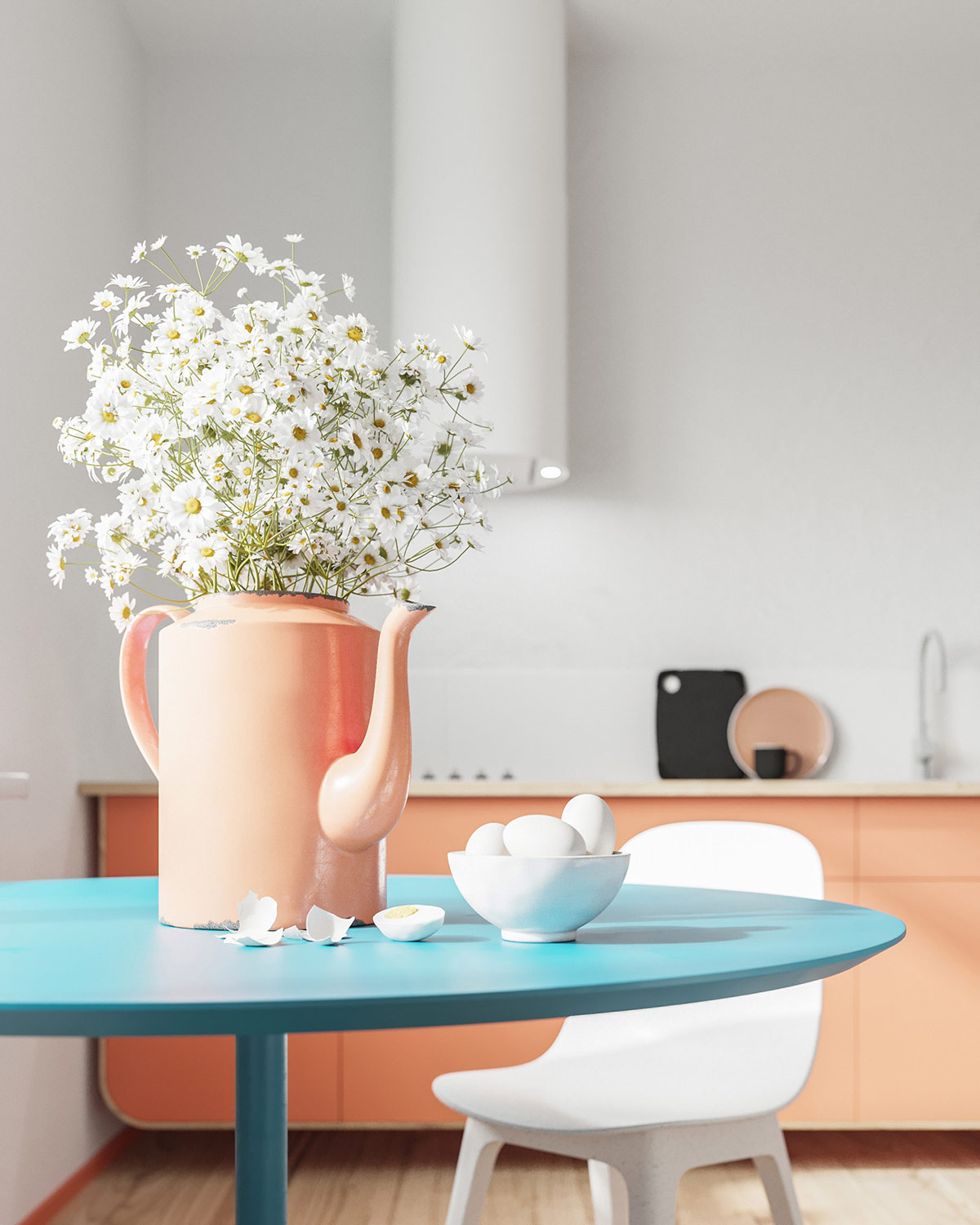 Cận cảnh b&igrave;nh hoa từ ấm nước sơn m&agrave;u hồng pastel đặt tr&ecirc;n b&agrave;n ăn