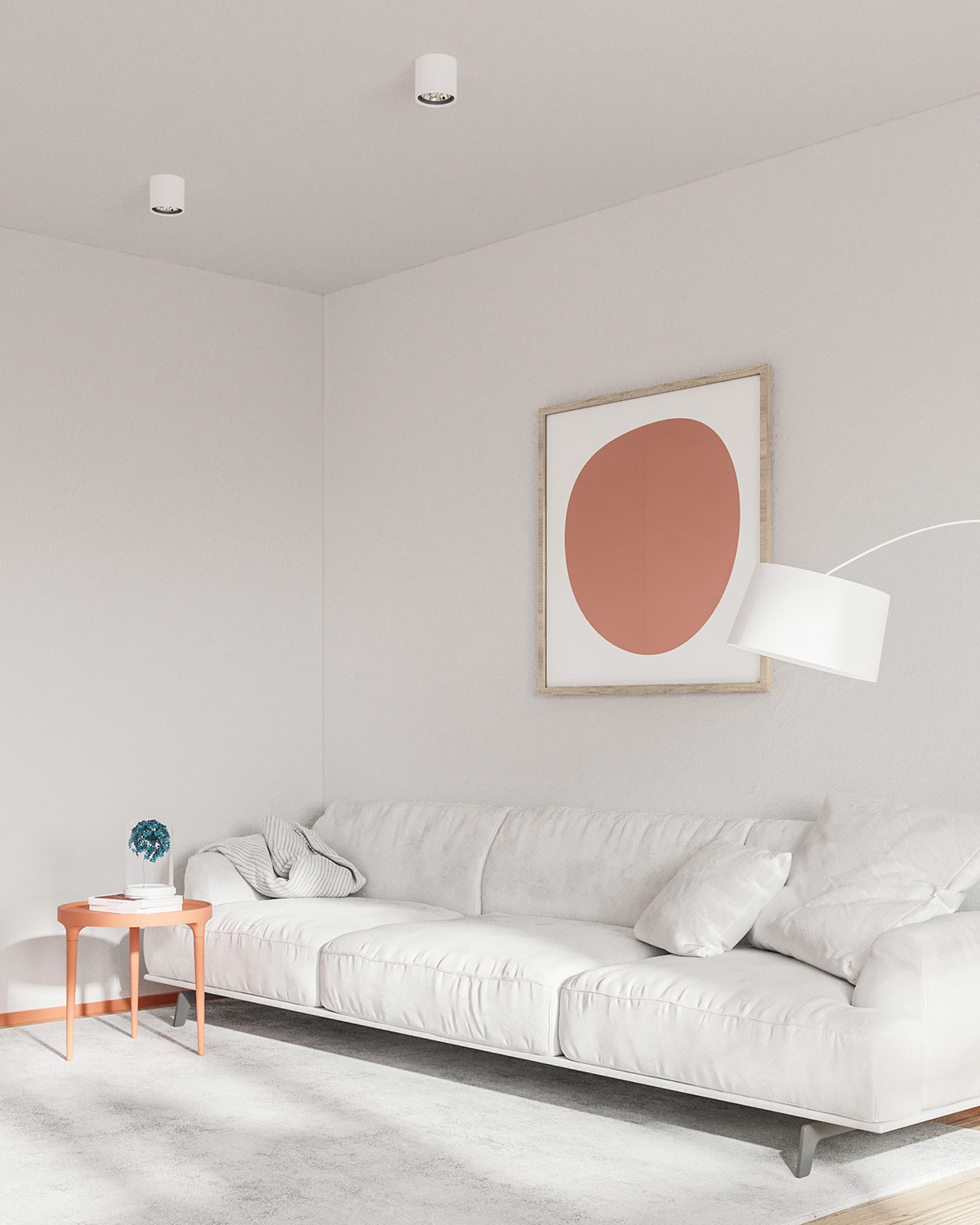 H&igrave;nh ảnh một g&oacute;c ph&ograve;ng kh&aacute;ch với sofa d&agrave;i m&agrave;u trắng, b&agrave;n tr&agrave; tr&ograve;n m&agrave;u cam đất, tranh treo tường ấn tượng