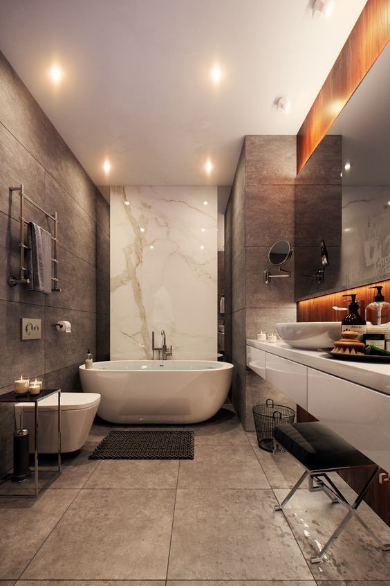 H&igrave;nh ảnh ph&ograve;ng tắm trong biệt thự 2 tầng phong c&aacute;ch hiện đại với gạch ốp l&aacute;t m&agrave;u x&aacute;m, bồn tắm lớn