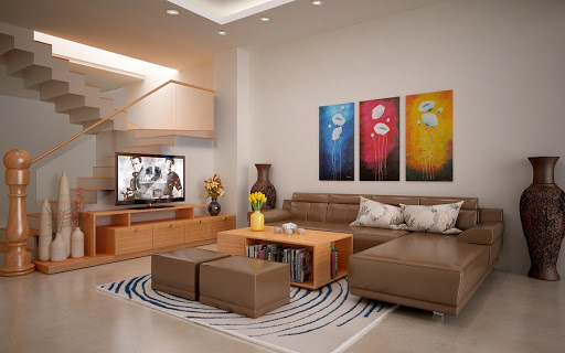 h&igrave;nh ảnh ph&ograve;ng kh&aacute;ch nh&agrave; cấp 4 với sofa da n&acirc;u, b&agrave;n tr&agrave; k&iacute;nh, bộ tranh treo tường t&ocirc;ng m&agrave;u bắt mắt