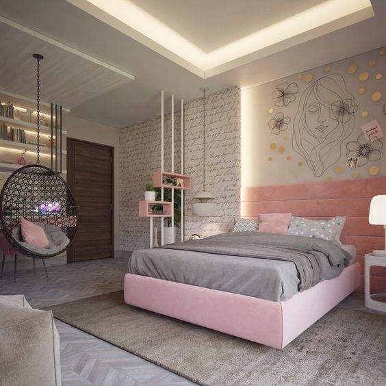h&igrave;nh ảnh mẫu ph&ograve;ng ngủ t&ocirc;ng m&agrave;u hồng x&aacute;m hiện đại, ghế treo m&agrave;u đen, đầu giường trang tr&iacute; tranh vẽ khu&ocirc;n mặt c&ocirc; g&aacute;i