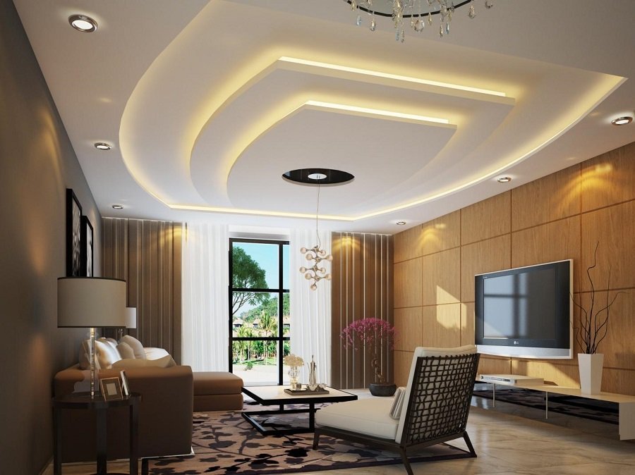 Trần thạch cao chìm cho nhà phố Hình ảnh phòng khách sử dụng trần thạch cao giật cấp bắt mắt.