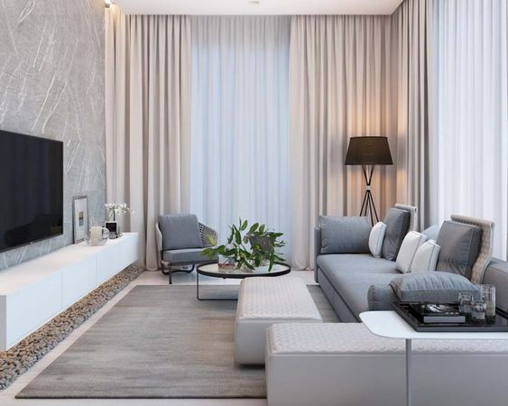 h&igrave;nh ảnh ph&ograve;ng kh&aacute;ch biệt thự 2 tầng với sofa m&agrave;u ghi x&aacute;m, kệ tivi, r&egrave;m cửa 2 lớp, b&agrave;n tr&agrave; k&iacute;nh h&igrave;nh tr&ograve;n