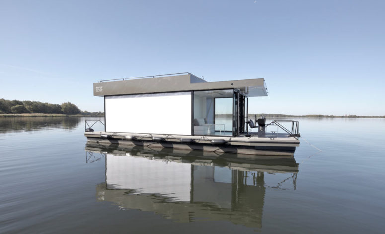 h&igrave;nh ảnh ng&ocirc;i nh&agrave; nổi tr&ecirc;n mặt nước m&agrave;u trung t&iacute;nh chủ đạo