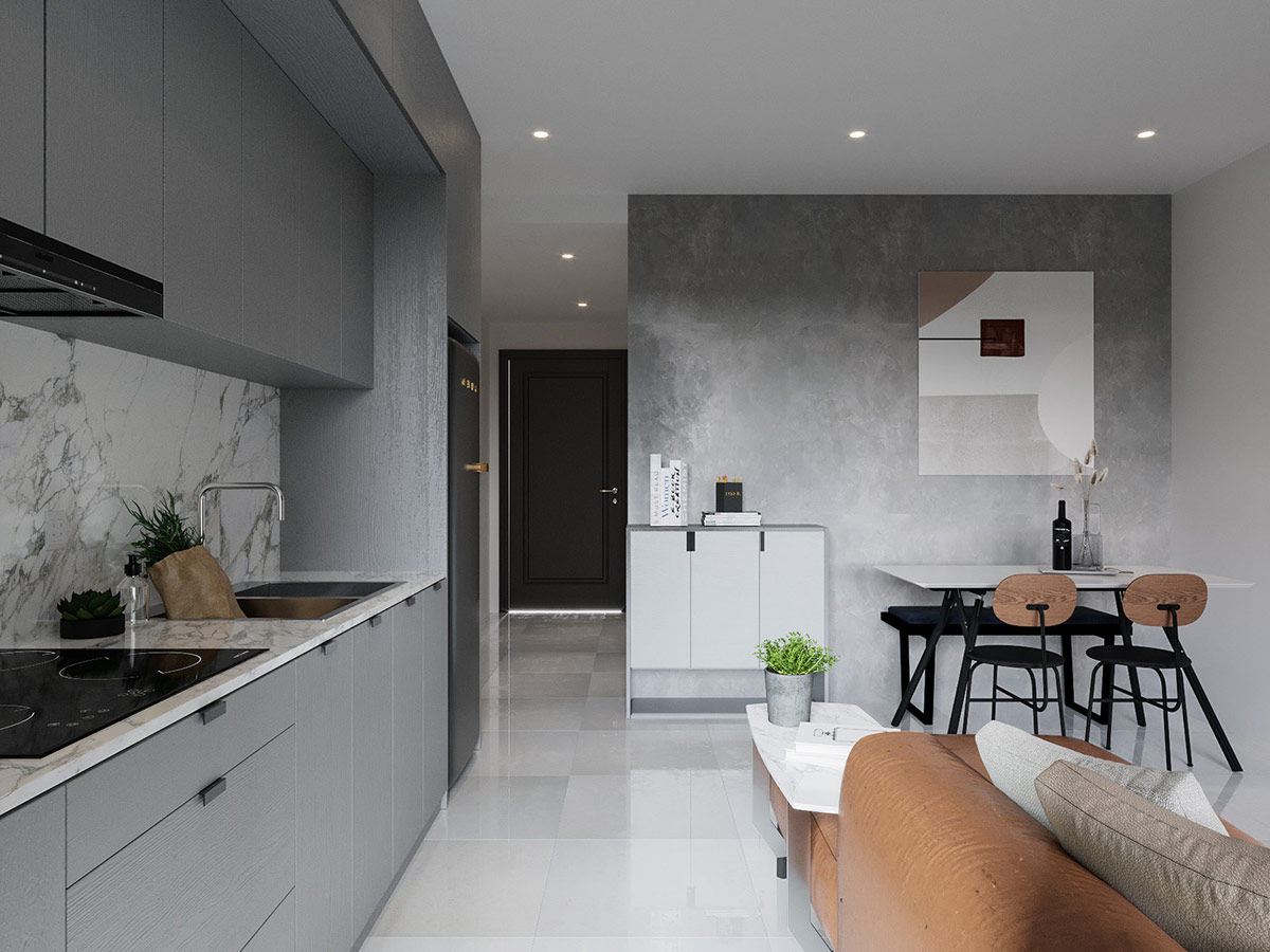 Khu bếp nấu được thiết kế ấm tường gọn đẹp, để kh&ocirc;ng cản trở tầm nh&igrave;n từ cửa ch&iacute;nh ​ v&agrave;o nh&agrave; v&agrave; ngược lại.