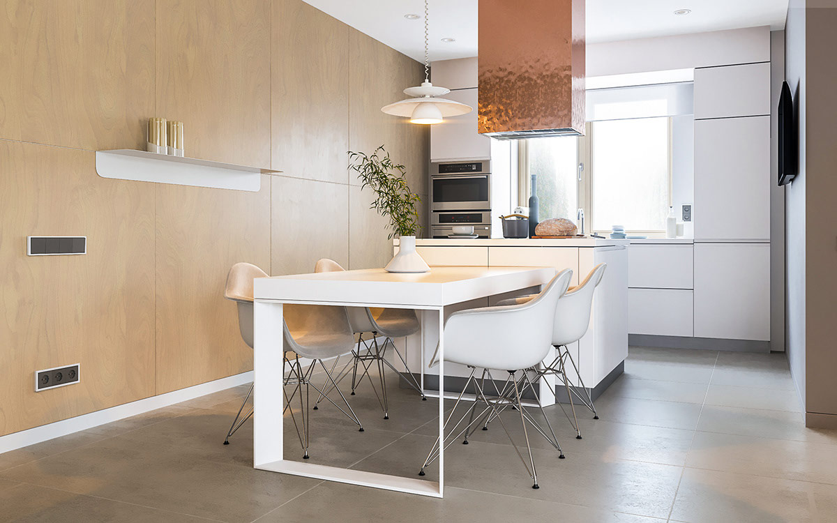 B&agrave;n ăn tựa như một phần k&eacute;o d&agrave;i của đảo bếp. Ghế Eames Eiffel trắng kiểu d&aacute;ng cổ điển.