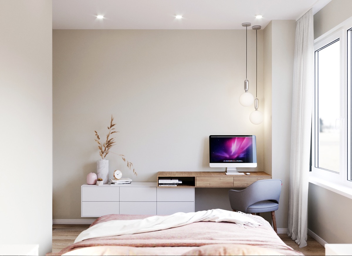 Trong ph&ograve;ng ngủ căn hộ nhỏ dưới 30m2, tủ kệ lưu trữ dạng nổi được thiết kế hợp nhất với b&agrave;n l&agrave;m việc, gi&uacute;p tiết kiệm diện t&iacute;ch đ&aacute;ng kể.