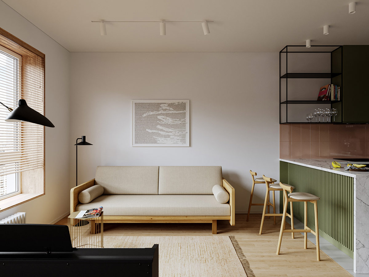 Trong ph&ograve;ng kh&aacute;ch căn hộ 36m2, một tấm thảm sợi tự nhi&ecirc;n v&agrave; ghế sofa m&agrave;u kem gi&uacute;p kh&ocirc;ng gian n&agrave;y lu&ocirc;n tho&aacute;ng đ&atilde;ng, tạo cảm gi&aacute;c rộng r&atilde;i hơn.