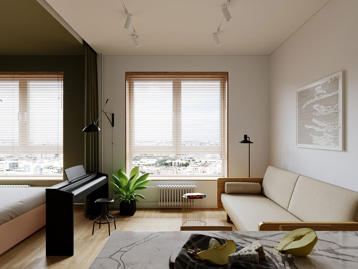 Đ&agrave;n piano điện ngăn khu vực tiếp kh&aacute;ch với ph&ograve;ng ngủ phong c&aacute;ch mở. R&egrave;m vải d&agrave;i v&agrave; d&agrave;y gi&uacute;p ngăn chia ph&ograve;ng chắc chắn hơn nếu gia chủ muốn sự ri&ecirc;ng tư thiết yếu.