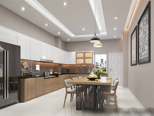 Phòng bếp kết hợp phòng ăn thoáng rộng với hệ tủ lưu trữ cánh phẳng tạo độ thông thoáng nhất định cho không gian nấu nướng.