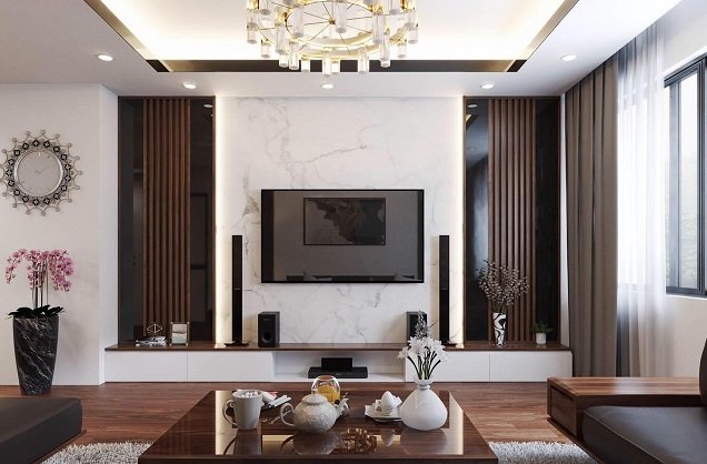 Bức tường đối diện sofa v&agrave; b&agrave;n tr&agrave; được decor đơn gian m&agrave; sang trọng, gi&uacute;p t&ocirc;n l&ecirc;n vẻ đẹp của đồ nội thất, thiết bị điện tử.