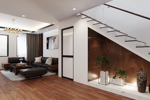 một g&oacute;c ph&ograve;ng kh&aacute;ch với lối cầu thang l&ecirc;n tầng tr&ecirc;n shophouse