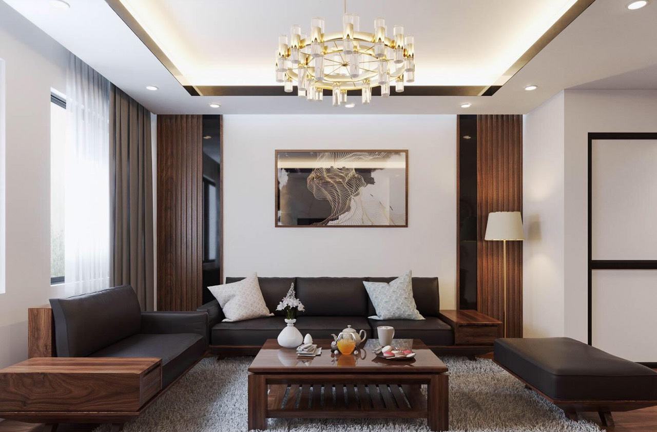 Thiết kế nội thất ph&ograve;ng kh&aacute;ch tinh tế v&agrave; đồng bộ giữa ghế sofa, b&agrave;n tr&agrave;, kệ tivi. Sắc m&agrave;u của gỗ &oacute;c ch&oacute; mang đến vẻ đẹp vừa sang trọng, vừa ấm &aacute;p, gần gũi.