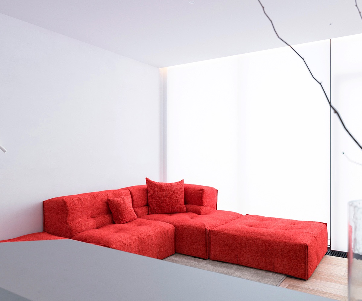 h&igrave;nh ảnh to&agrave;n cảnh ph&ograve;ng kh&aacute;ch căn hộ 64m2 với ghế sofa m&agrave;u đỏ cam nổi bật