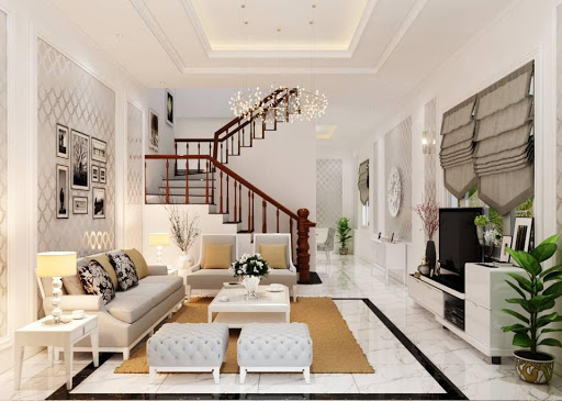 Phòng khách nhà ống 3 tầng được bài trí với bảng màu trắng sáng sang trọng, thanh lịch. Kiểu dáng nội thất mang hơi hướng cổ điển.