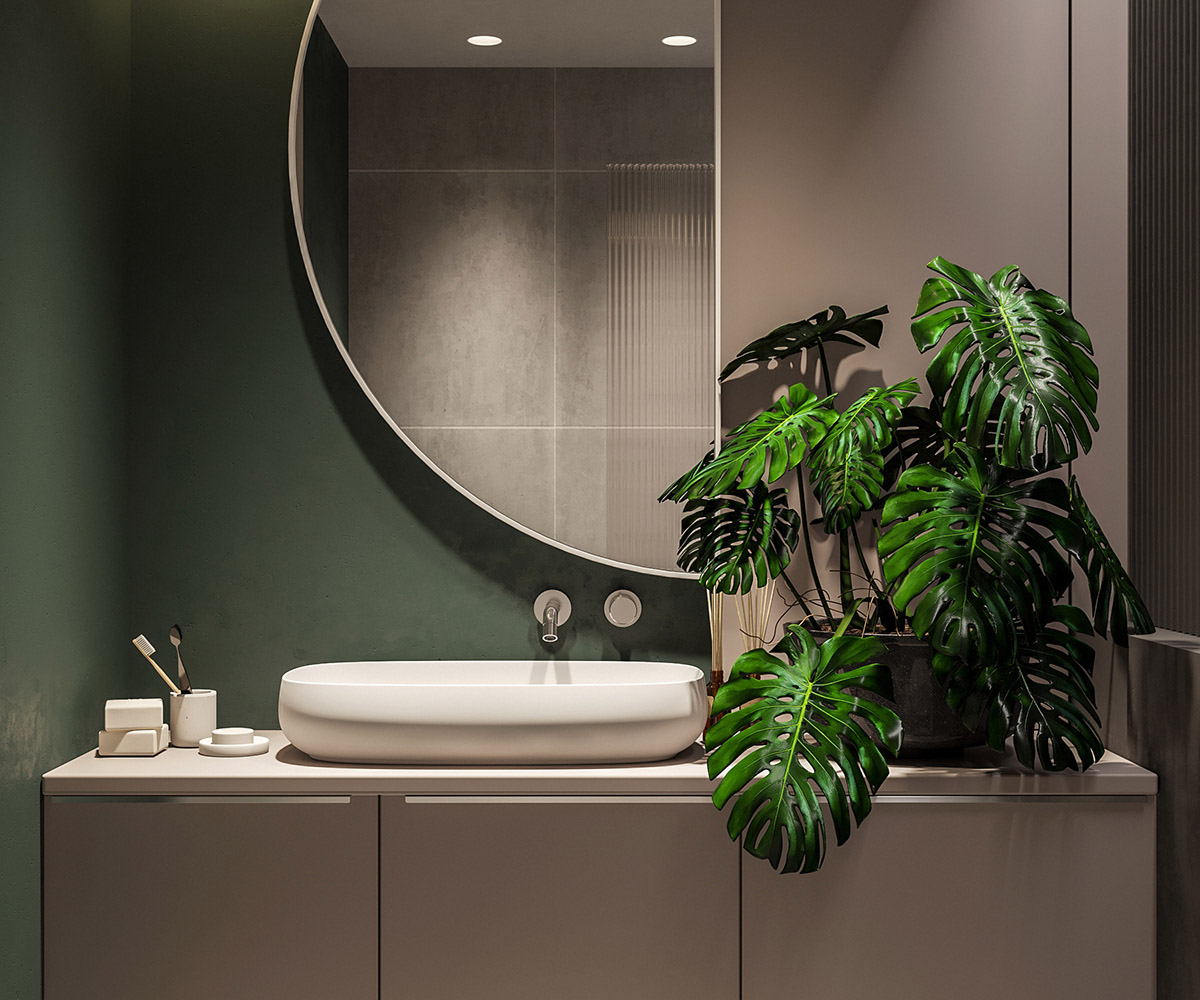 Một chiếc gương treo tường h&igrave;nh b&aacute;n nguyệt thiết lập khu vực bồn rửa ấn tượng.