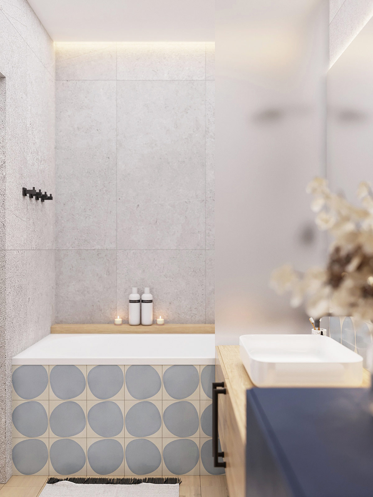 Tấm ốp trang tr&iacute; bồn tắm m&agrave;u xanh lam v&agrave; đ&egrave;n nền mang đến nguồn năng lượng tươi mới, tr&agrave;n đầy cho ph&ograve;ng tắm nhỏ.