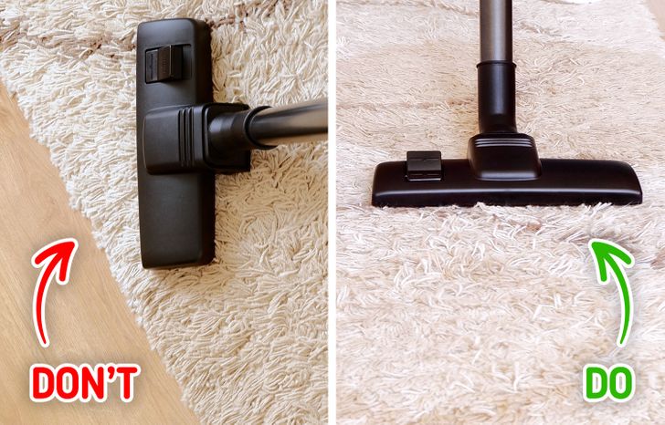hình ảnh máy hút bụi màu đen trên thảm trải lông trắng