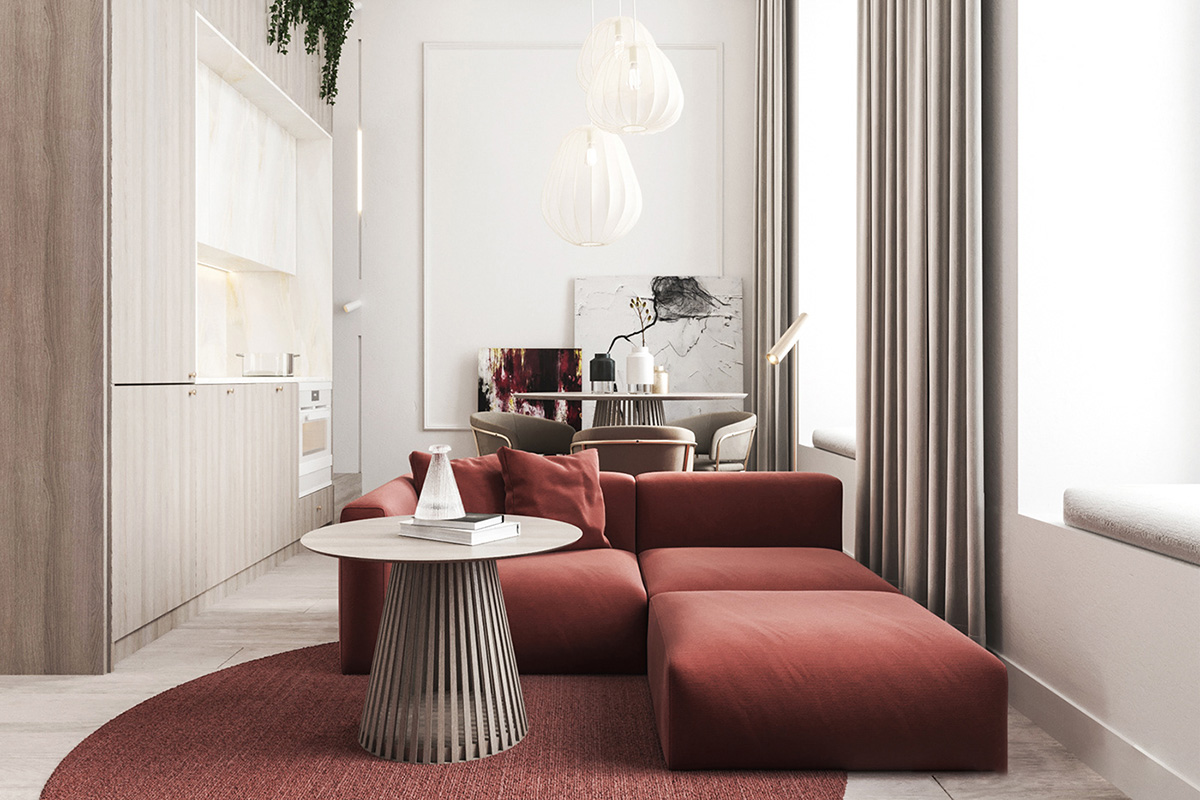ph&ograve;ng kh&aacute;ch căn hộ sử dụng nội thất m&agrave;u đỏ ấn tượng với sofa đặt tr&ecirc;n thảm trải c&ugrave;ng sắc đỏ