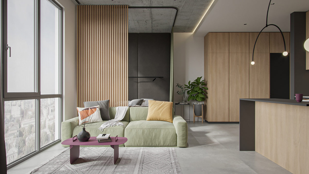 Trong ph&ograve;ng kh&aacute;ch căn hộ 38m2, một chiếc ghế sofa m&agrave;u xanh l&aacute; nhạt, gối tựa m&agrave;u v&agrave;ng v&agrave; chiếc b&agrave;n c&agrave; ph&ecirc; m&agrave;u nho phối kết tinh tế với thảm trải s&agrave;n m&agrave;u x&aacute;m thanh lịch.
