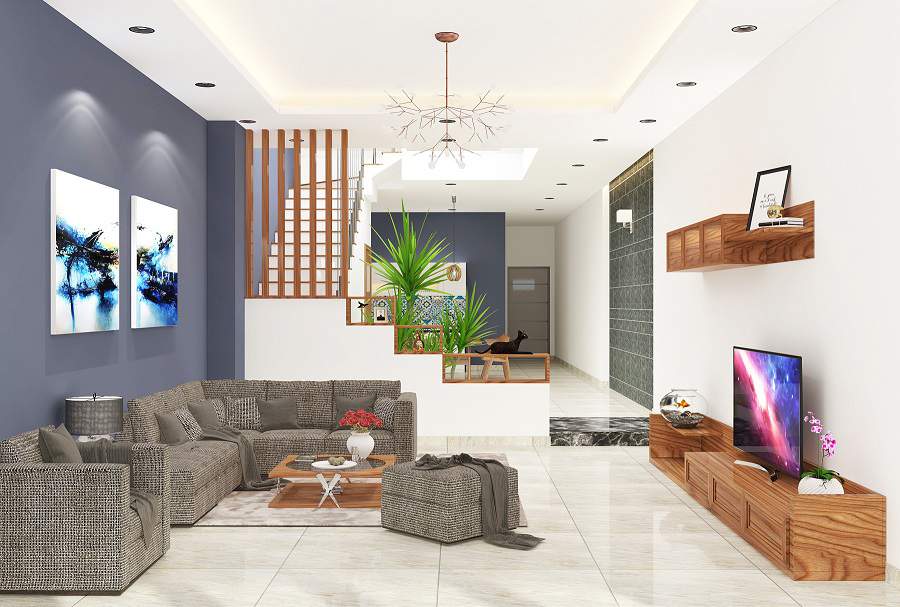 Ph&ograve;ng kh&aacute;ch nh&agrave; ống 2 tầng c&oacute; thiết kế đơn giản, tiết chế tối đa đồ nội thất, chỉ sử dụng những sản phẩm thiết yếu như sofa, kệ tivi, b&agrave;n tr&agrave;. Cầu thang ki&ecirc;m v&aacute;ch ngăn trang tr&iacute; đẹp kh&ocirc;ng gian tiếp kh&aacute;ch v&agrave; nh&agrave; bếp.