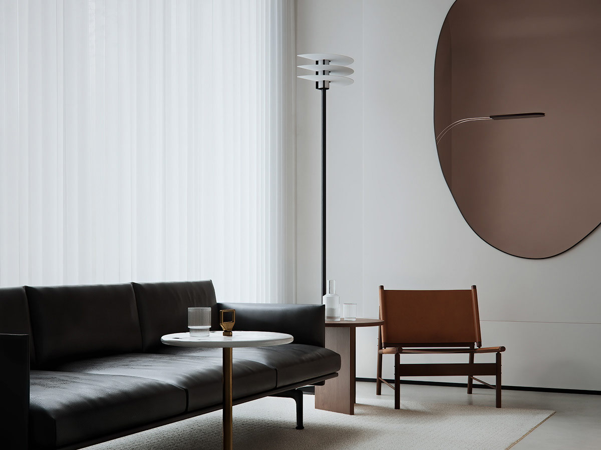 h&igrave;nh ảnh g&oacute;c ph&ograve;ng kh&aacute;ch với sofa da đen, b&agrave;n c&agrave; ph&ecirc; tr&ograve;n, gương treo tường phản chiếu đ&egrave;n s&agrave;n, r&egrave;m cửa m&agrave;u trắng