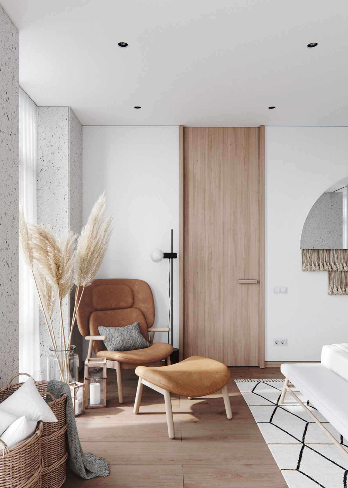 Một chiếc ghế salon đầy phong c&aacute;ch mang lại điểm nhấn ấm &aacute;p cho khu vực cửa sổ, nơi những b&ocirc;ng cỏ lau kh&ocirc; nằm gọn trong chiếc b&igrave;nh thủy tinh cao.