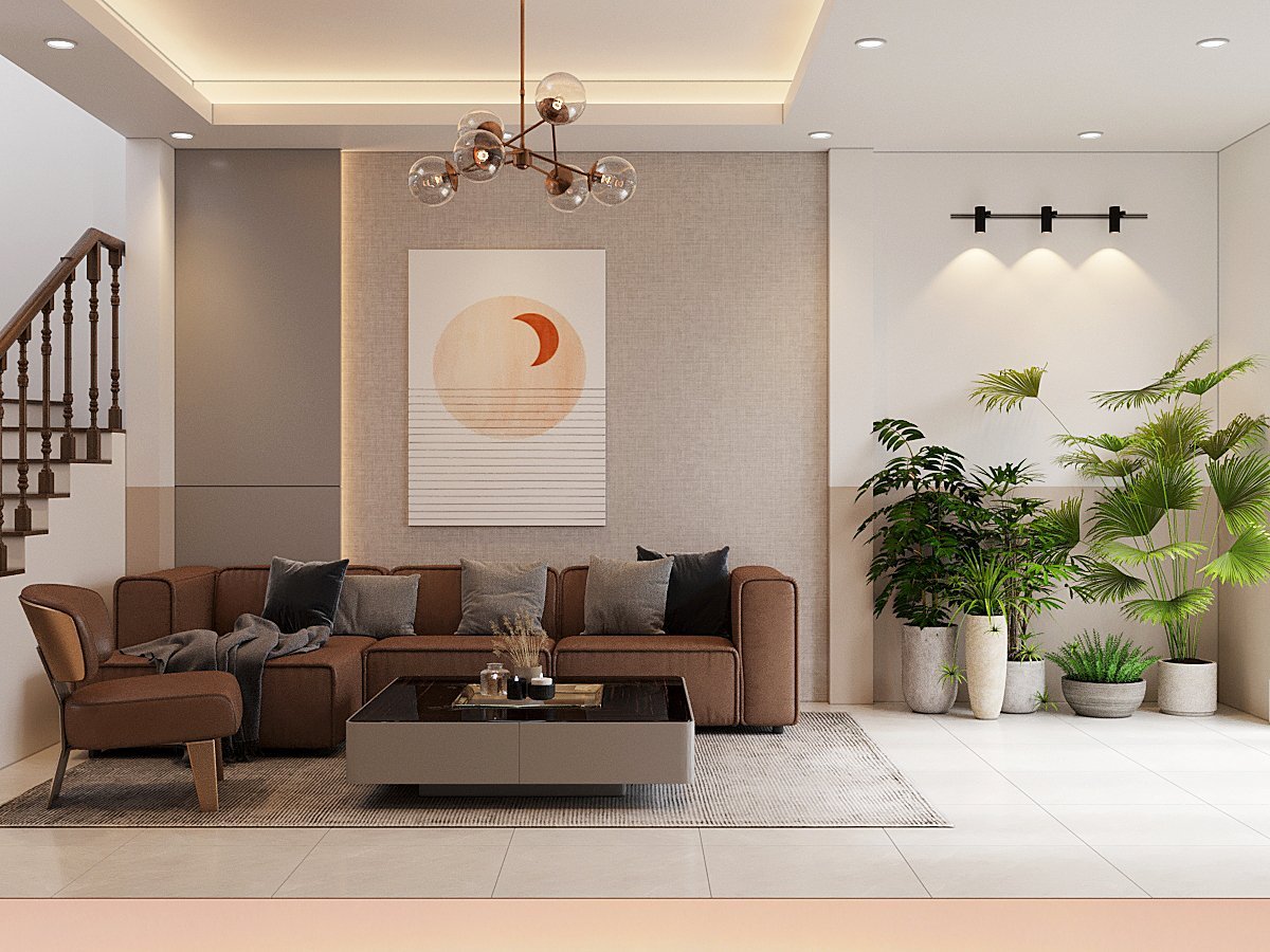 Ngay sau cửa chính vào nhà là phòng khách khá rộng rãi, ngập tràn ánh sáng tự nhiên. Những chậu cây xanh tốt trở thành khoảng đệm sinh động, mát mắt trước khi bước vào không gian chính, tạo cảm giác gần gũi với thiên nhiên.