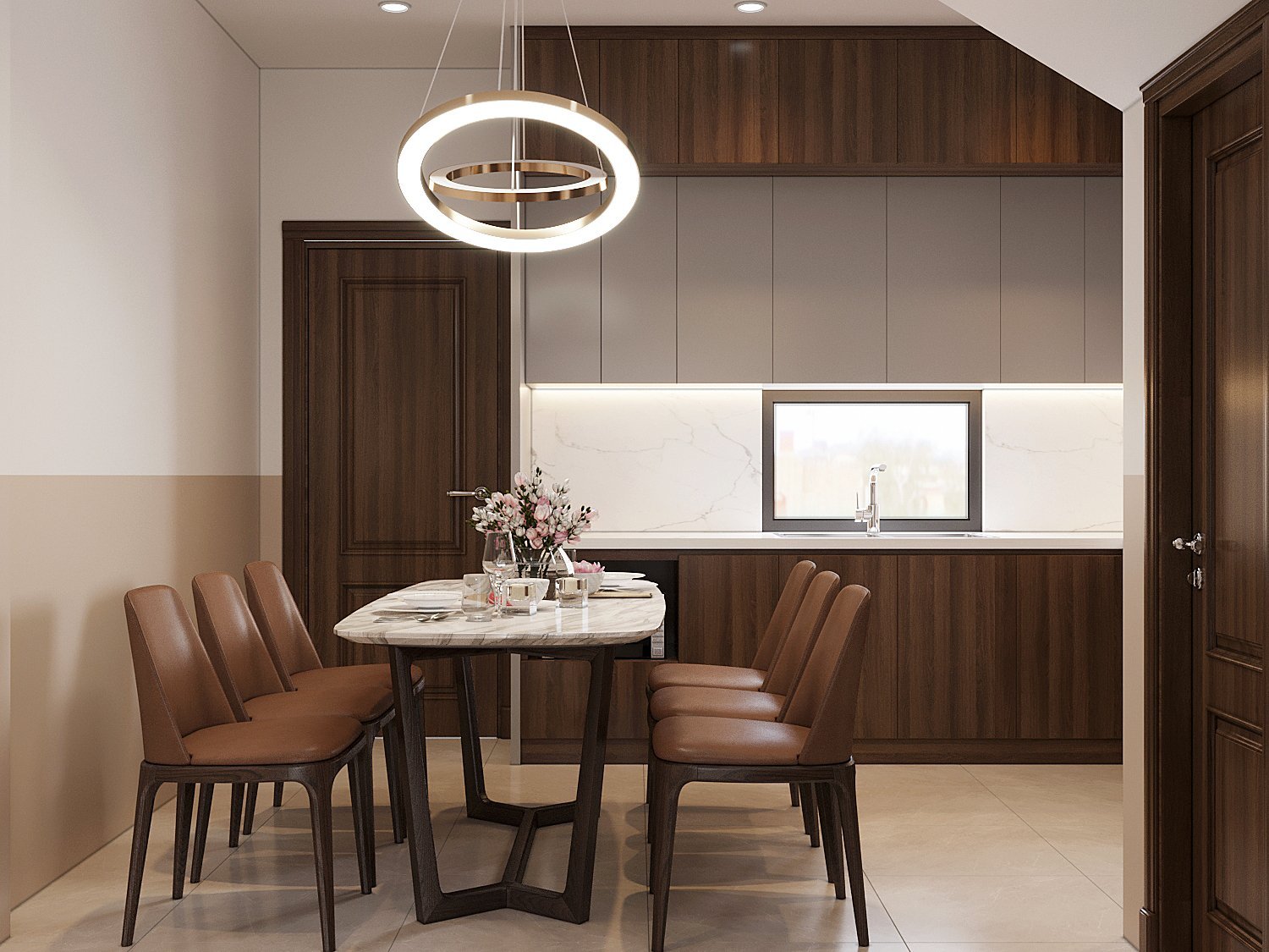Diện tích phòng bếp ăn khá chật hẹp nhưng không hề tạo cảm giác bí bức nhờ sự phối kết màu sắc tinh tế với các mảng sáng trắng chủ đạo.
