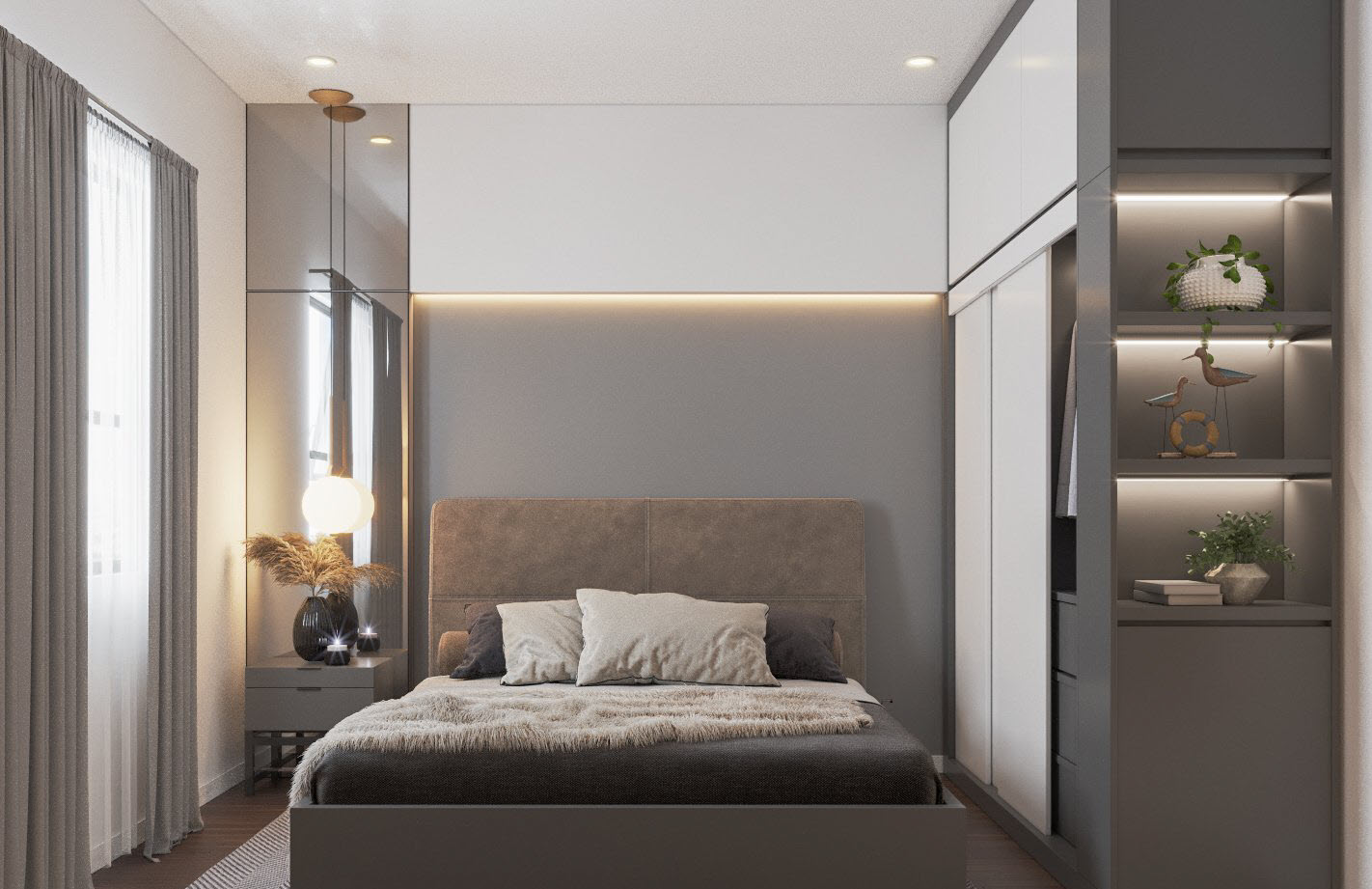 Các khối tủ kệ lưu trữ được bố trí xung quanh giường ngủ, tạo cảm giác vững chãi, riêng tư, mà vẫn đảm bảo sự thông thoáng cần thiết.