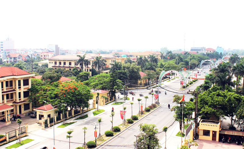 nhiều c&ocirc;ng tr&igrave;nh nh&agrave; ở, c&acirc;y xanh trong th&agrave;nh phố