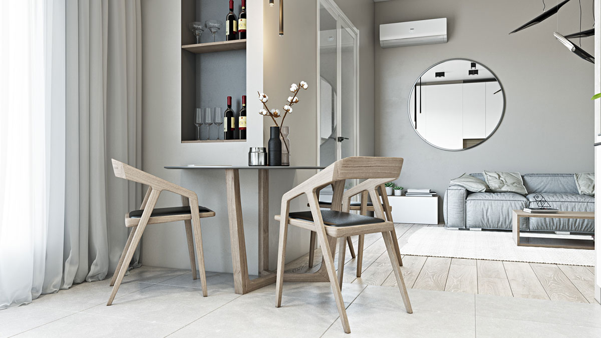 Khoảng trống cạnh cửa sổ k&iacute;nh được tận dụng để bố tr&iacute; b&agrave;n ăn v&agrave; tủ rượu gọn đẹp. Gương tr&ograve;n tạo cảm gi&aacute;c mềm mại, h&uacute;t s&aacute;ng tự nhi&ecirc;n hiệu quả.