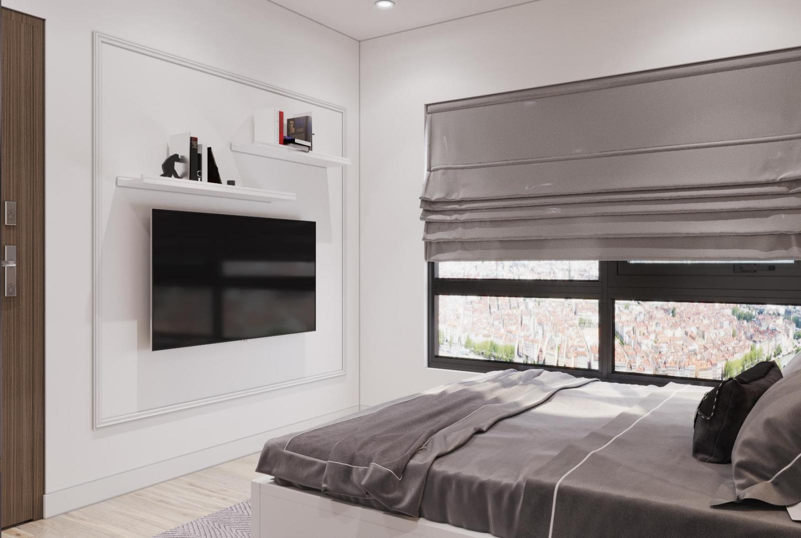 Kệ tivi treo tường trong phòng ngủ căn hộ 53m2 được thiết kế đơn giản, nhỏ gọn, tinh tế. Sắc trắng tinh khôi như "tàng hình", không cồng kềnh, chiếm diện tích.