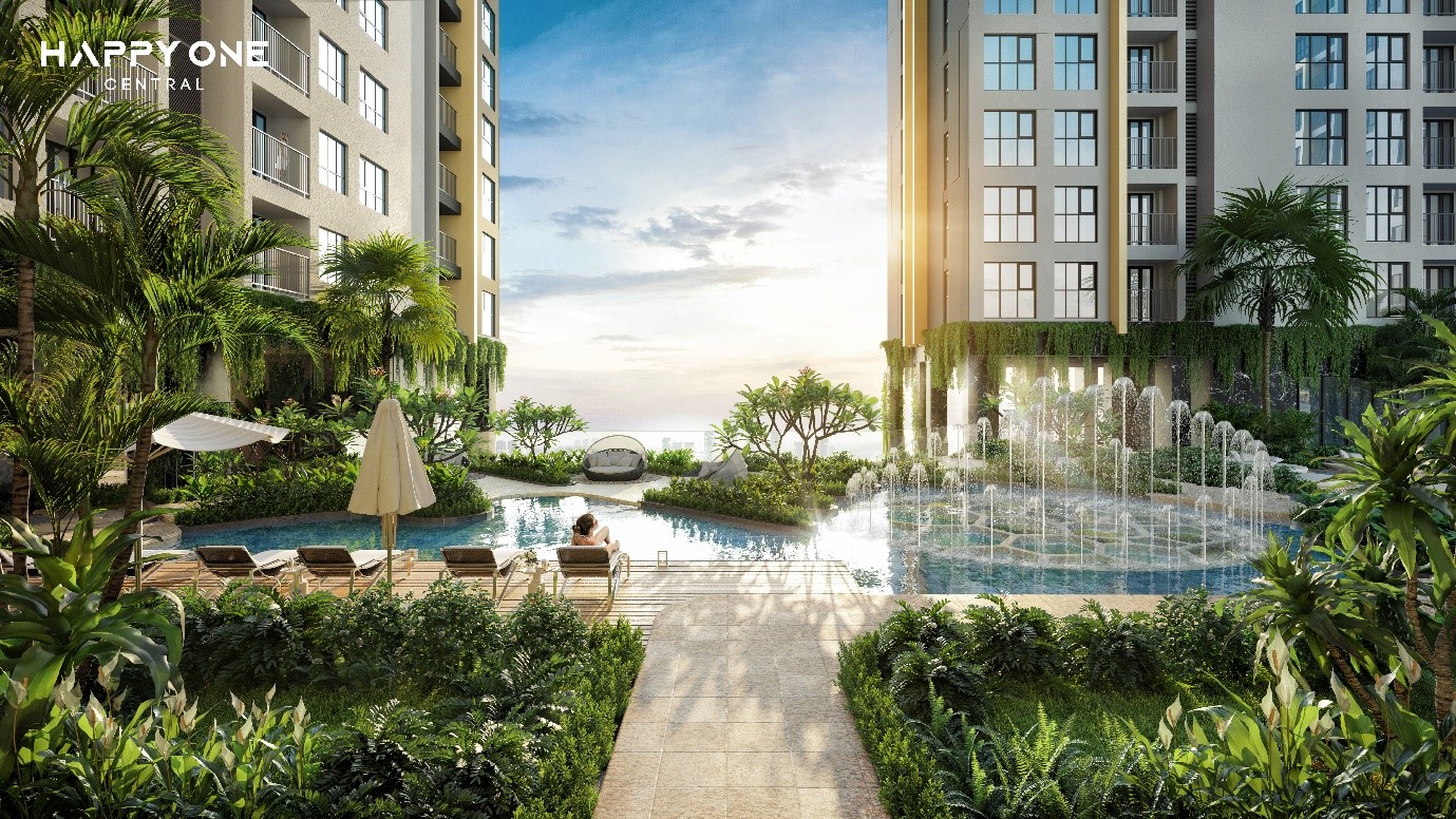 bể bơi nằm giữa c&oacute; hai to&agrave; nh&agrave; cao tầng hai b&ecirc;n