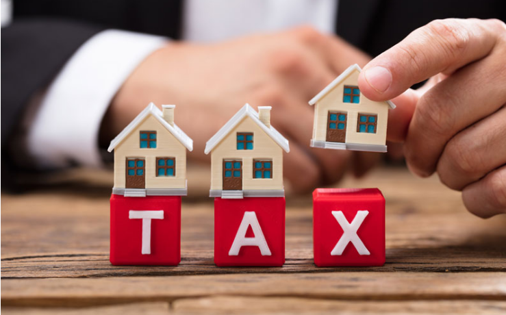 hình ảnh chữ TAX màu đỏ gồm 3 khối, đầu chữ đội mô hình ngôi nhà