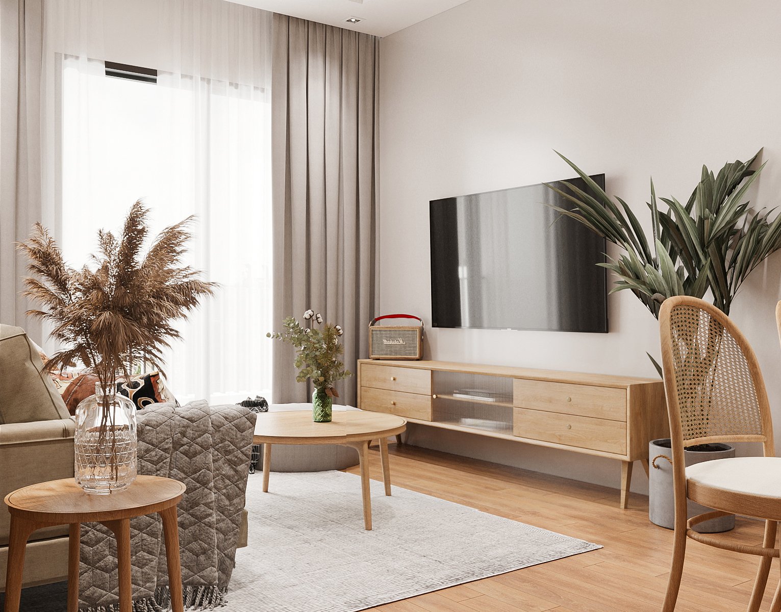 C&acirc;y xanh trang tr&iacute; trở th&agrave;nh điểm nhấn m&agrave;u sắc sinh động, h&uacute;t mắt cho kh&ocirc;ng gian tiếp kh&aacute;ch trong căn hộ 83m2.