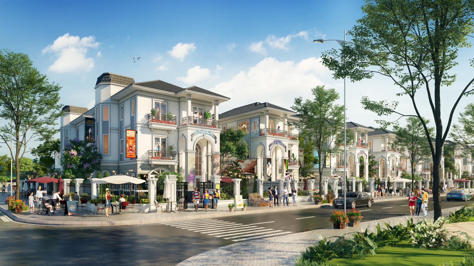 d&atilde;y nh&agrave; nằm cạnh đường lớn c&oacute; nhiều người đang đi lại