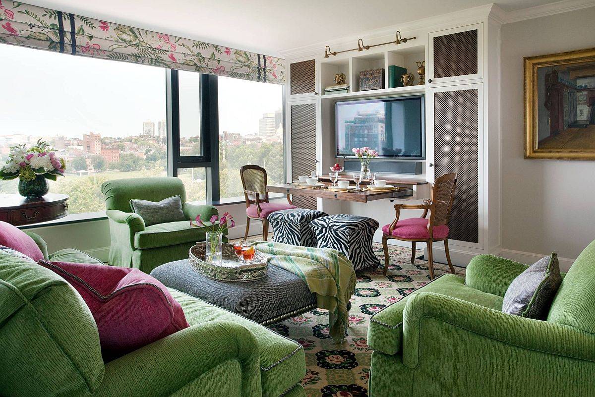 h&igrave;nh ảnh ph&ograve;ng kh&aacute;ch với ghế sofa m&agrave;u xanh l&aacute;, ph&ograve;ng ăn l&agrave; một phần mở rộng của bếp 