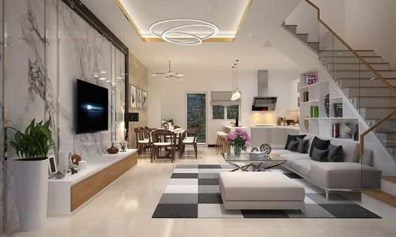 Trong nhà ống 5 tầng kết hợp kinh doanh, phòng khách, phòng ăn và bếp nấu được thiết kế liên thông không sử dụng tường ngăn