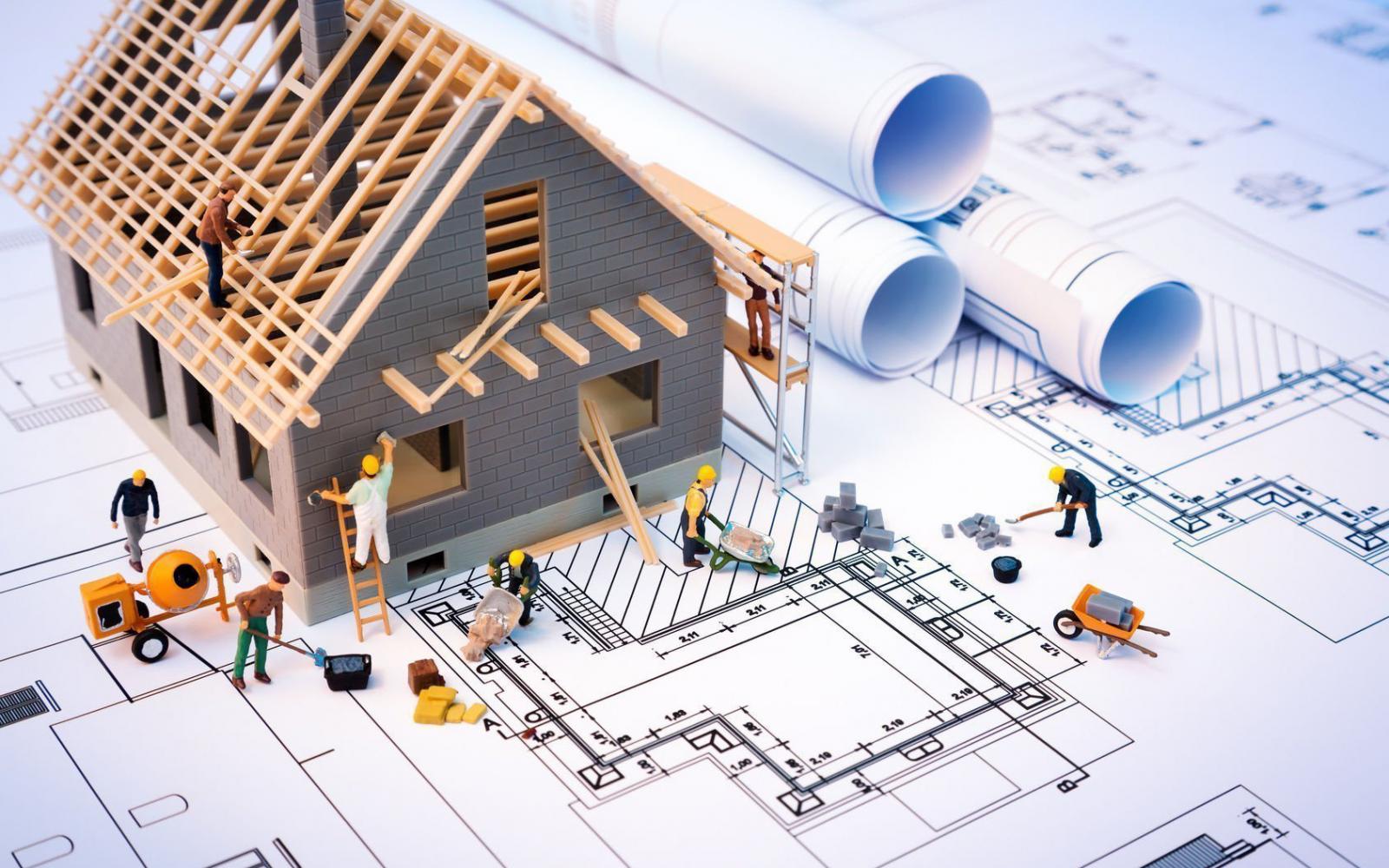 hình ảnh mô hình ngôi nhà với các thợ đang thi công