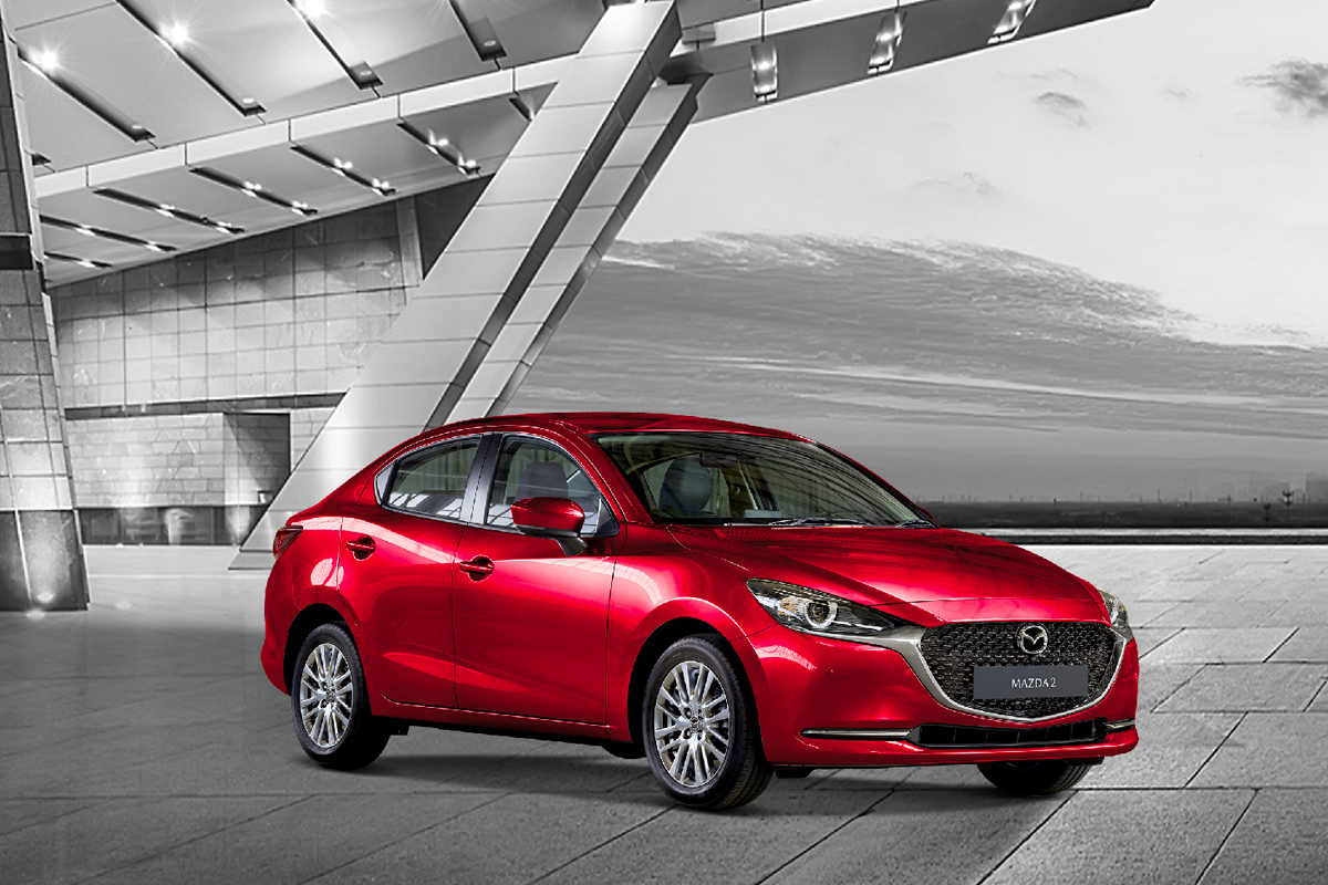 Khách mua dòng sedan Mazda2, Mazda3 trong tháng này cũng được hỗ trợ tương đương 50% lệ phí trước bạ
