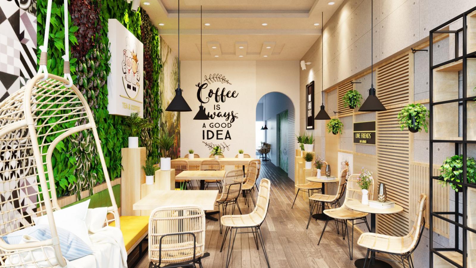 Không gian quán sinh động, xinh tươi hơn với những chậu cây xanh mát treo tường, tạo cảm giác chào đón, gần gũi thiên nhiên.