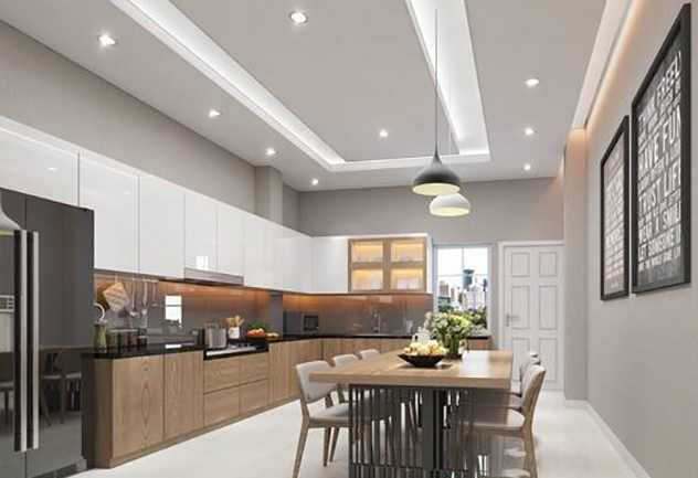 Bếp tích hợp phòng ăn phong cách hiện đại, nổi bật với hệ tủ bếp cánh phẳng, cung cấp không gian lưu trữ rộng rãi.